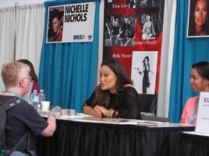 Tia Carrere at her table