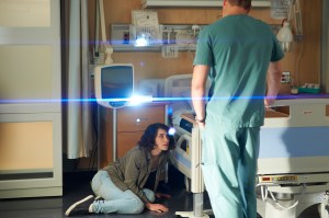 Liane Balaban with Michael Shanks (back to camera) as Charlie Harris