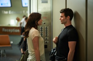 Alex (Erica Durance) and Joel (Daniel Gillies) in the elevator hopefully not to make out