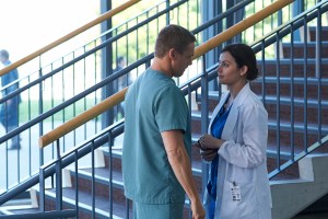 Erica Durance as Alex Reid and Michael Shanks as Charlie Harris