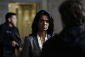 Jacqueline (Anjali Jay) being confronted by someone.