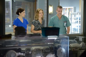 Alex (Erica Durance) and Charlie (Michael Shanks
