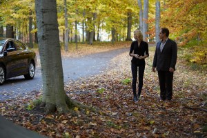 Laura Vandervoort as Elena Michaels and Daniel Kash as Roman Navikev