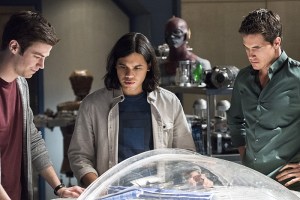 The Flash -- "Fast Enough" -- Image FLA123C_0262b -- Pictured (L-R): Grant Gustin as Barry Allen, Carlos Valdes as Cisco Ramon, and Robbie Amell as Ronnie -- Photo: Dean Buscher/The CW -- é 2015 The CW Network, LLC. All rights reserved.