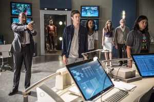 The Flash -- "The Man Who Saved Central City" -- Image FLA201b_0388b -- Pictured (L-R): Jesse L. Martin as Detective Joe West, Grant Gustin as Barry Allen, Candice Patton as Iris West, Danielle Panabaker as Caitlin Snow, Victor Garber as Professor Stein and Carlos Valdes as Cisco Ramon -- Photo: Cate Cameron /The CW -- ÃÂ© 2015 The CW Network, LLC. All rights reserved