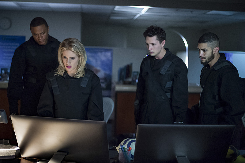 Arrow -- "Vigilante" -- Image AR507b_0063b.jpg -- Pictured (L-R): David Ramsey as John Diggle, Emily Bett Rickards as Felicity Smoak, Joe Dinicol as Rory Regan, and Rick Gonzalez as Rene Ramirez -- Photo: Diyah Pera/The CW -- ÃÂ© 2016 The CW Network, LLC. All Rights Reserved.