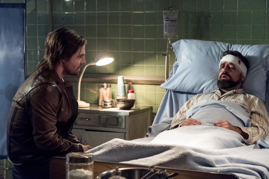 Arrow -- "Bratva" -- Image AR512b_0005b.jpg -- Pictured (L-R): Stephen Amell as Oliver Queen and David Nyki as Anatoly Knyazev -- Photo: Cate Cameron/The CW -- é 2017 The CW Network, LLC. All Rights Reserved.